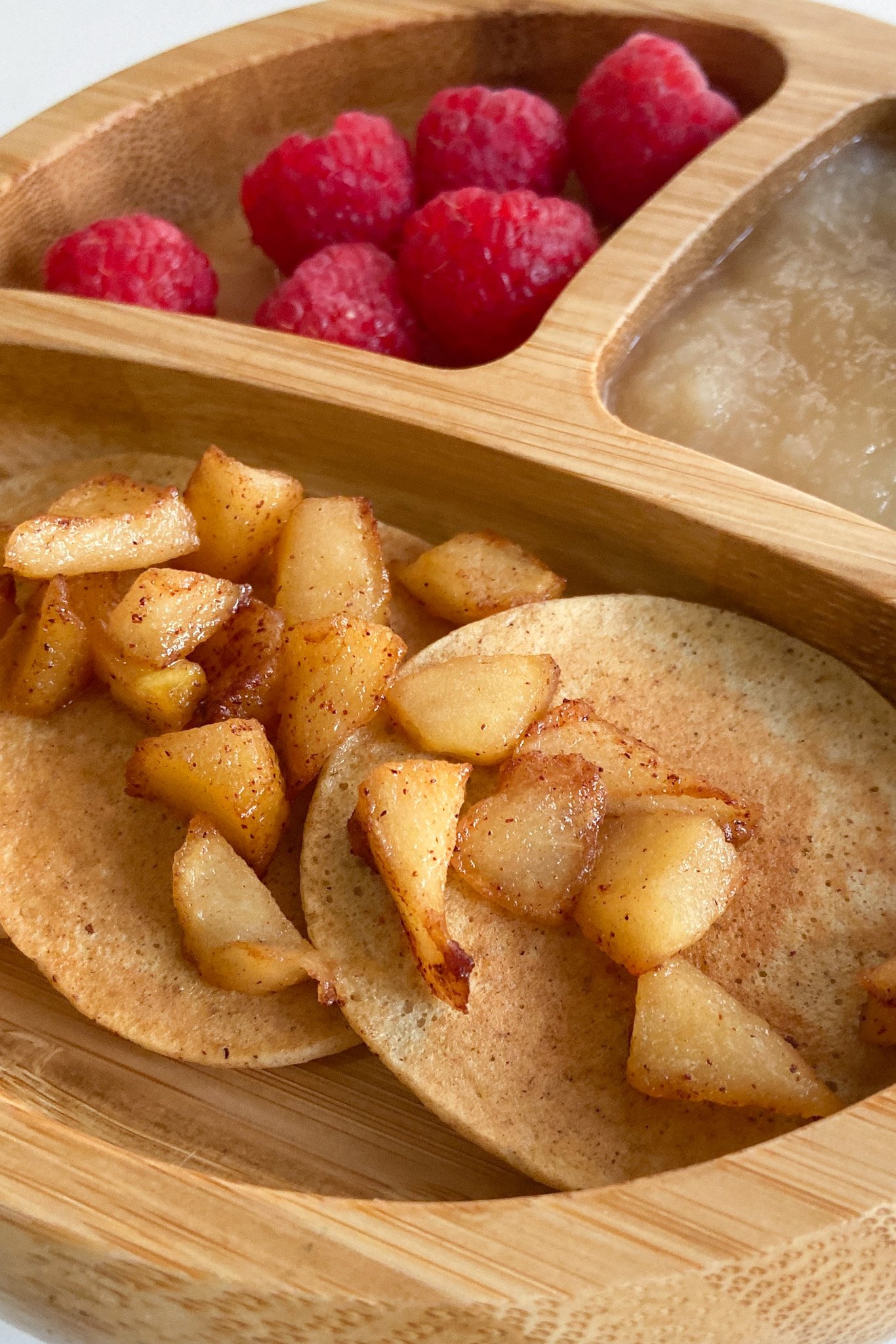 Cinnamon apple pancakes topped with cinnamon apples