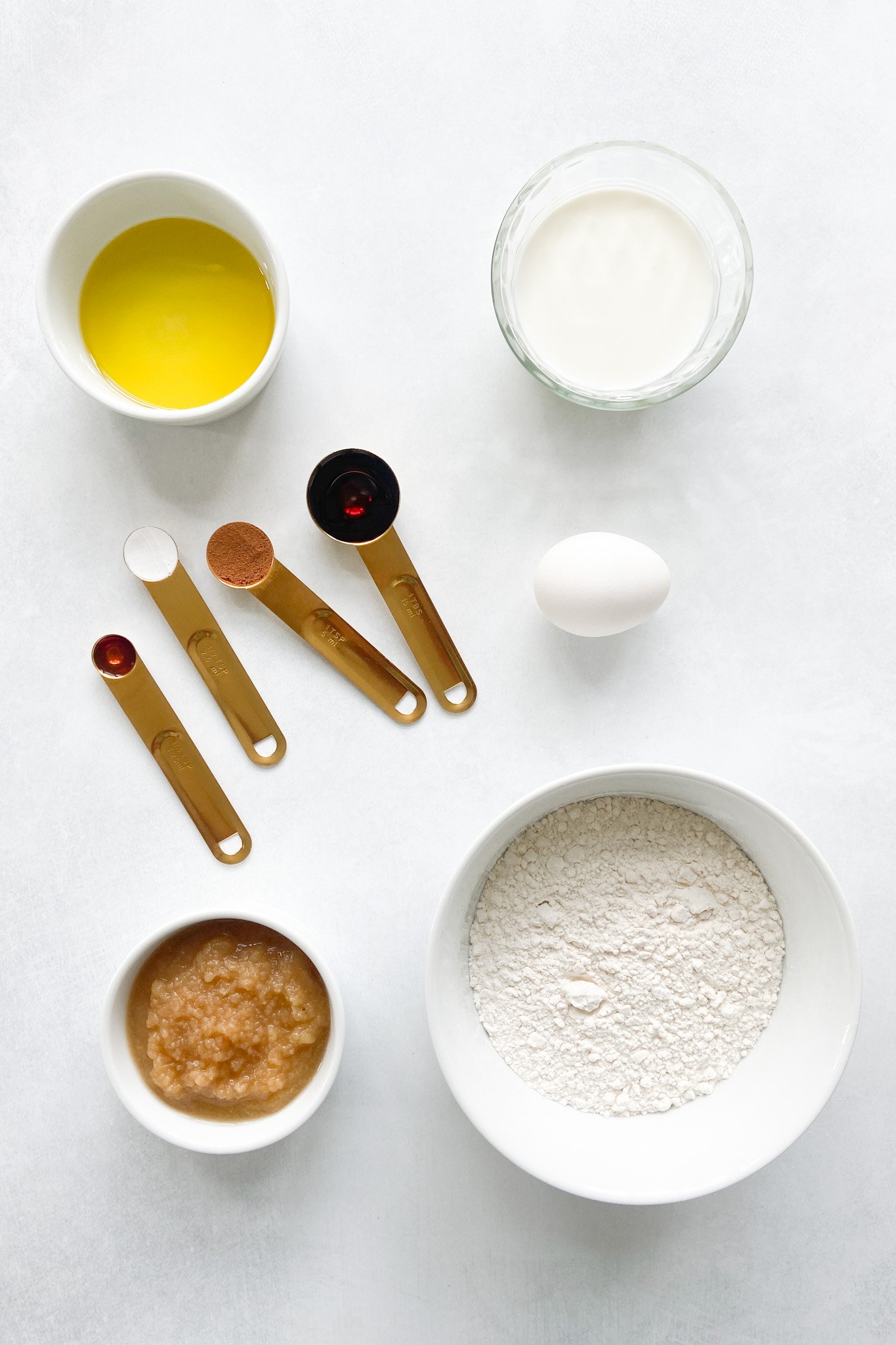 Ingredients to make cinnamon apple waffles. See recipe card for detailed ingredient quantities.