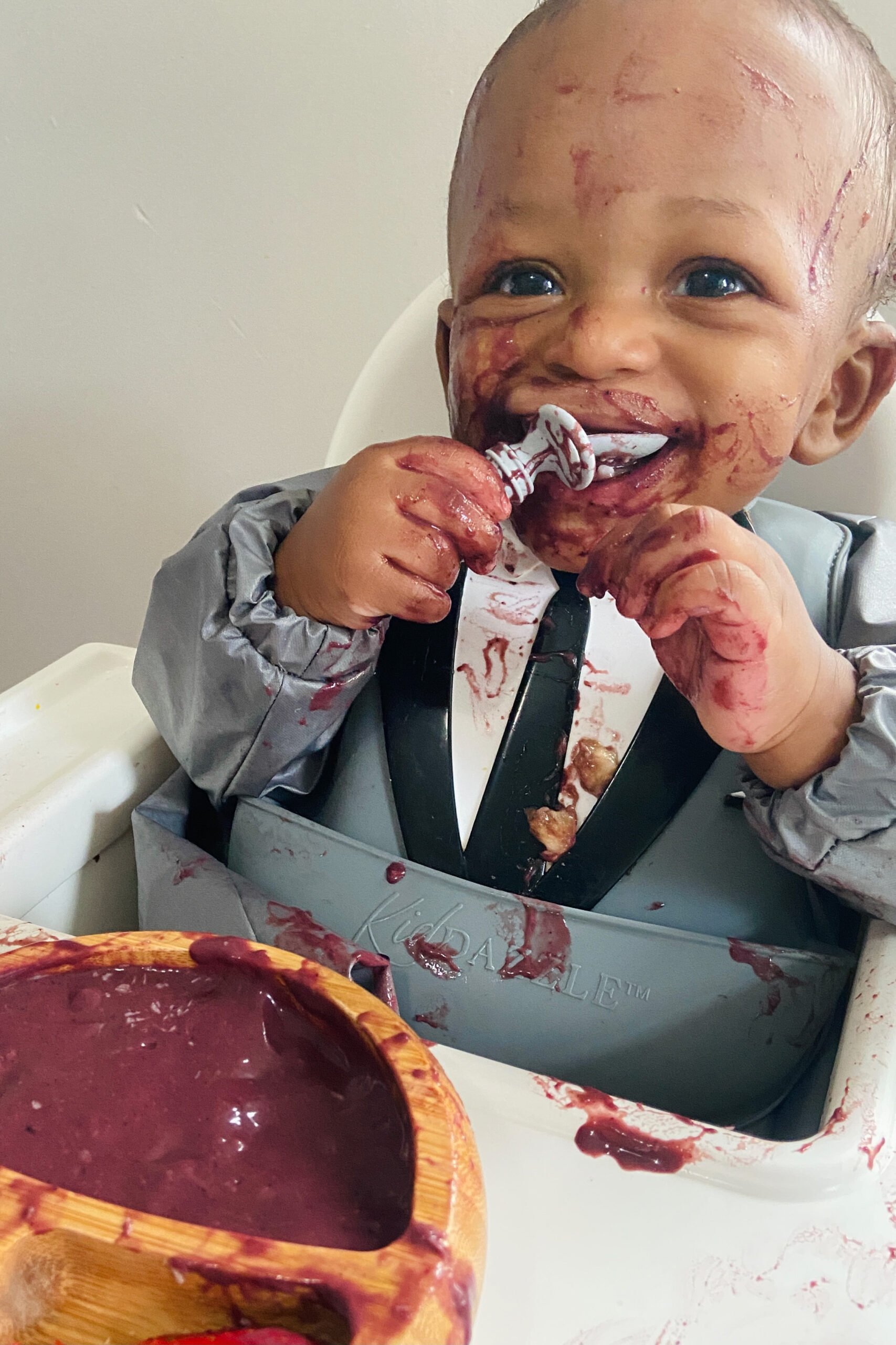 Baby eating an Acai bowl baby messy eater