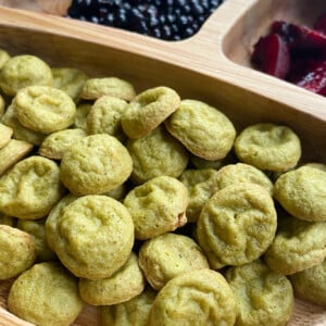 Spinach banana puffs served with blackberries and cherries