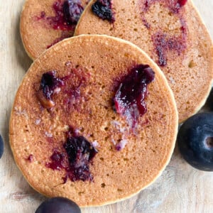 Blueberry oat pancakes served with blueberries
