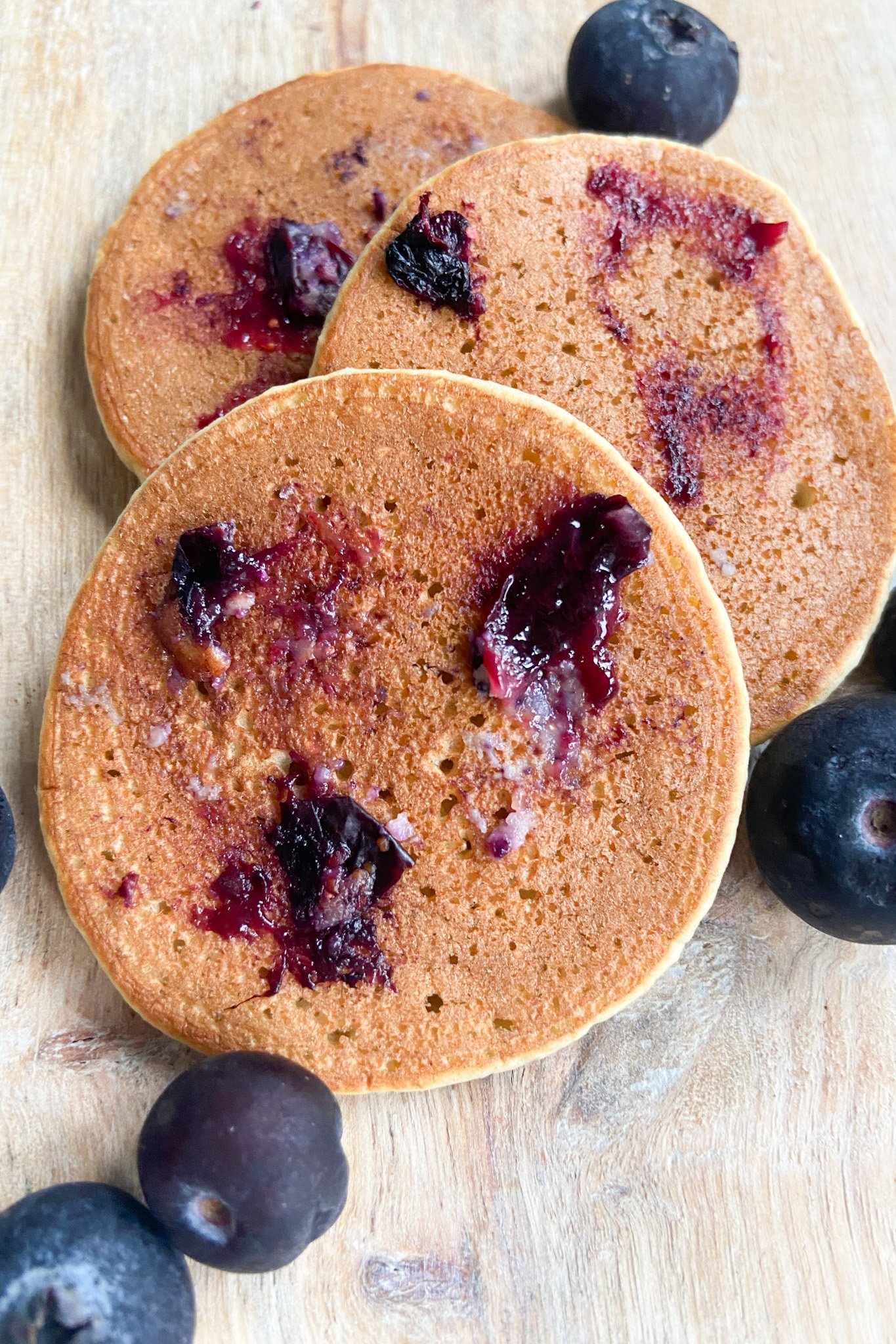 Blueberry oat pancakes served with blueberries