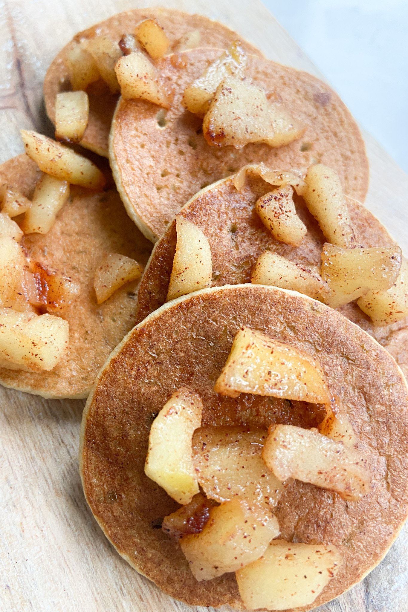 Cinnamon apple pancakes topped with cinnamon apples