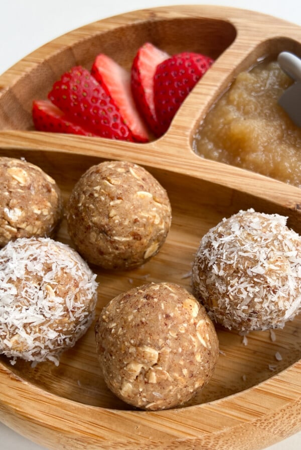 Apple pie bliss balls served with strawberries and applesauce