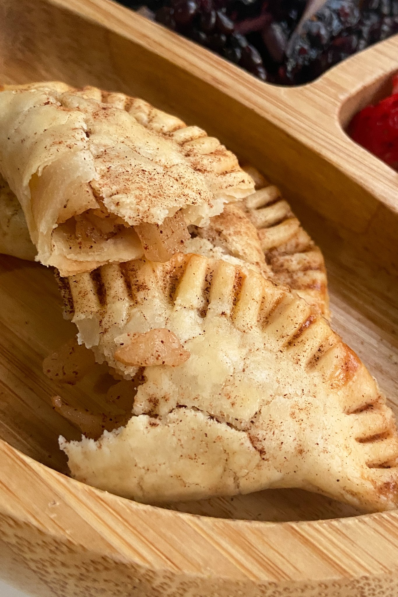 Apple pie empanadas with cinnamon apple pieces