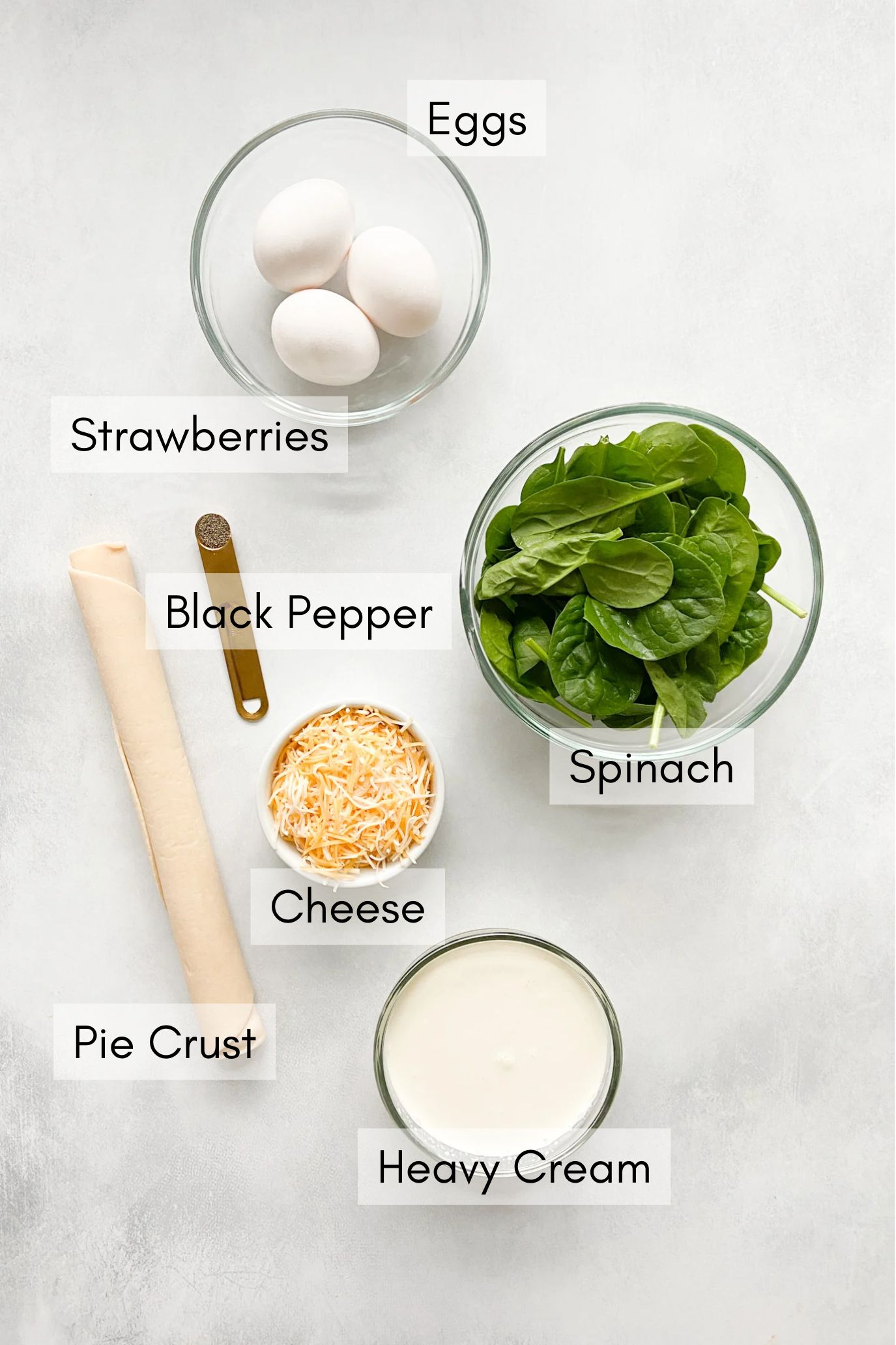 Ingredients to make mini spinach quiche.