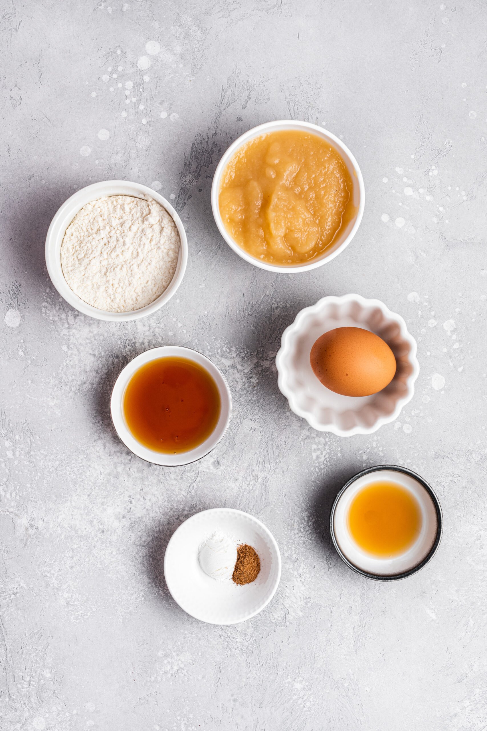 Ingredients to make cinnamon apple pancakes. Specifics provided in recipe card.