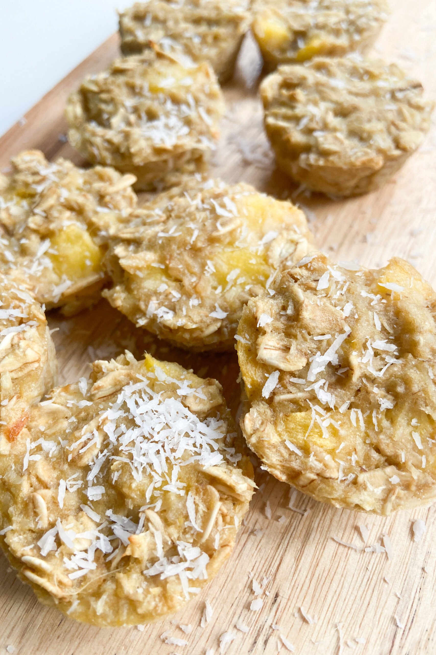 Mango banana oat bites with coconut sprinkled on top