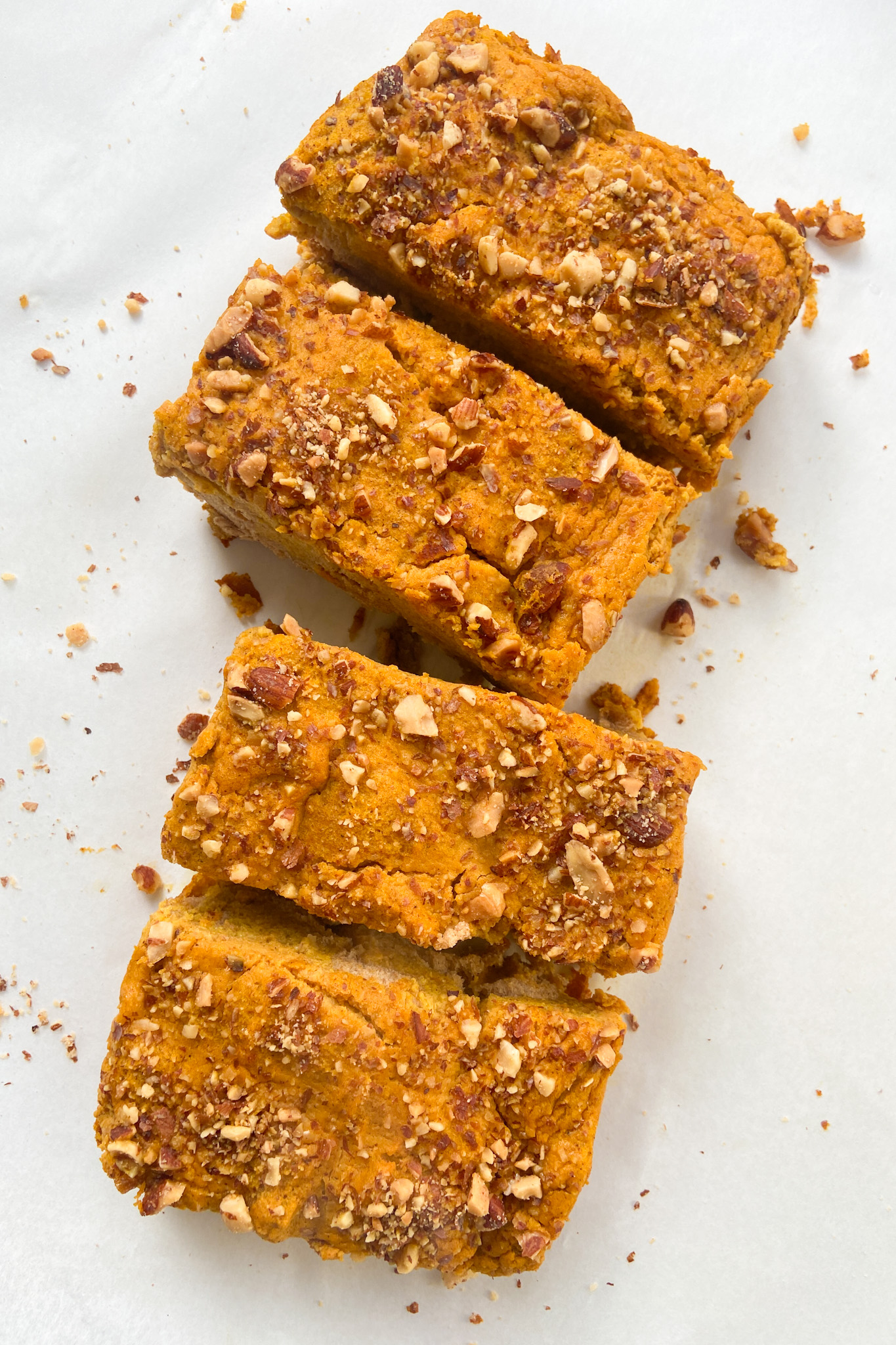 Pumpkin French toast bake sliced into four pieces.