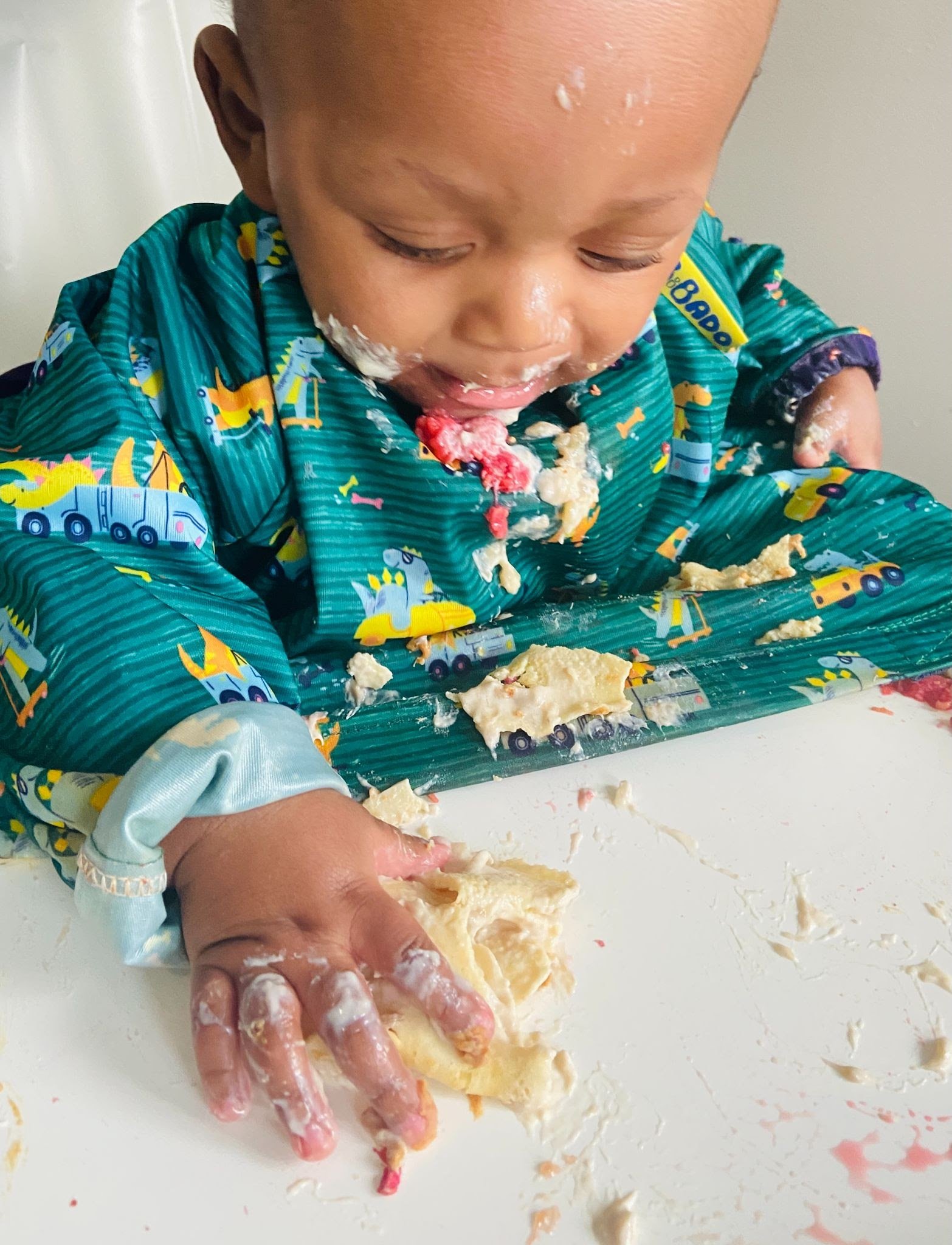 Messy baby eating breakfast baby-led weaning