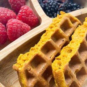 Pumpkin waffles served with raspberries and blackberries