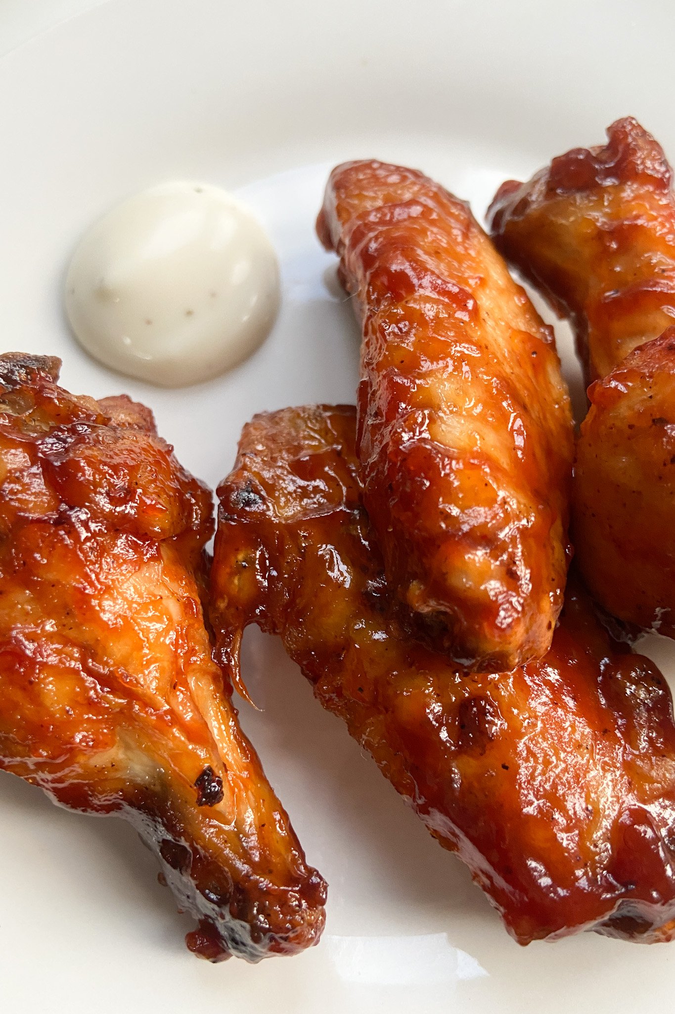 Air fryer chicken wings served with ranch dip