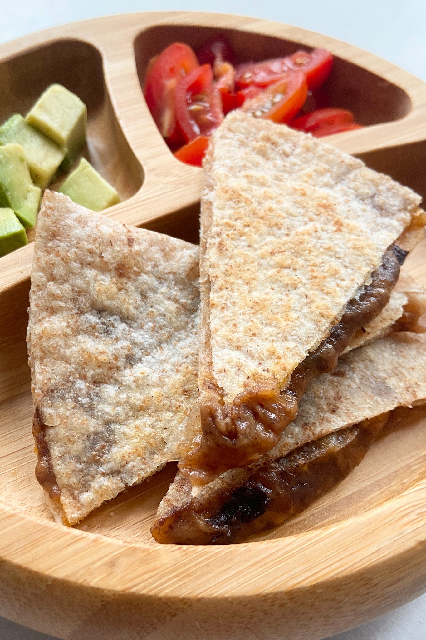 https://feedingtinybellies.com/wp-content/uploads/2022/01/Black-bean-and-cheese-quesadillas.jpg