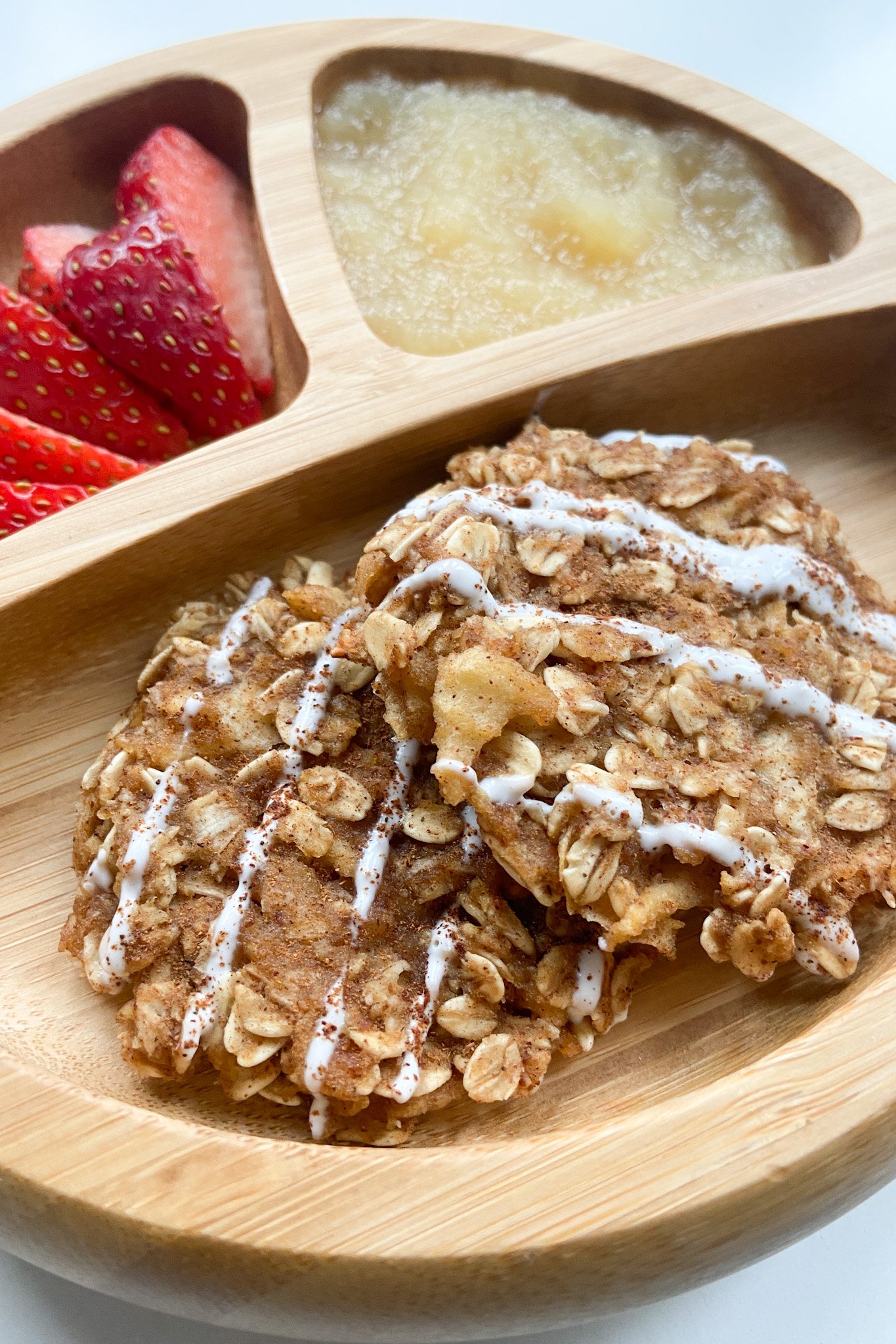 Cinnamon apple cookies served with strawberries and applesauce