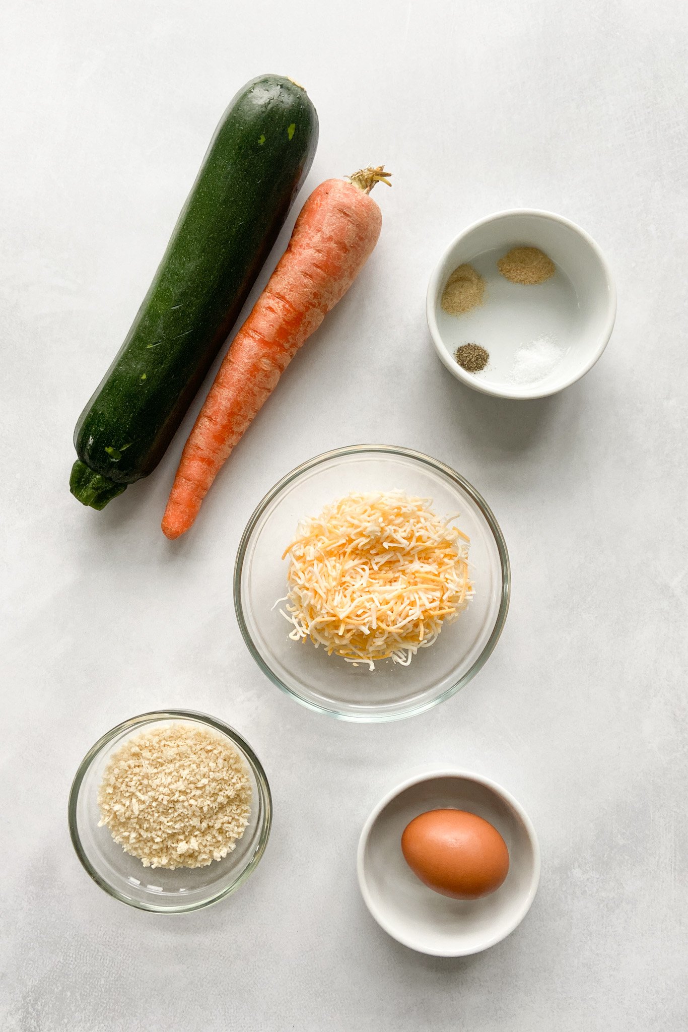 Ingredients to make zucchini carrot tots