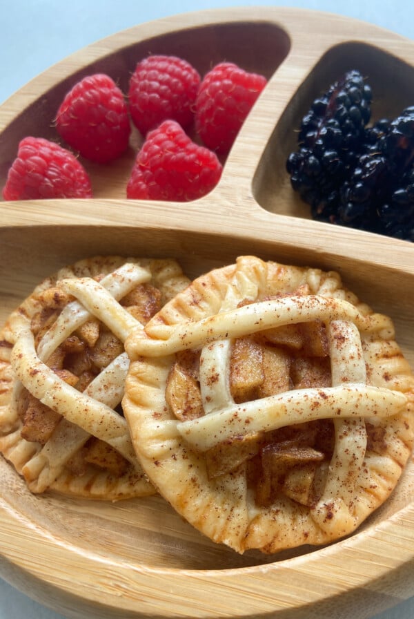 Healthy mini apple pies served with berries