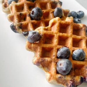 Blueberry banana waffles topped with blueberries