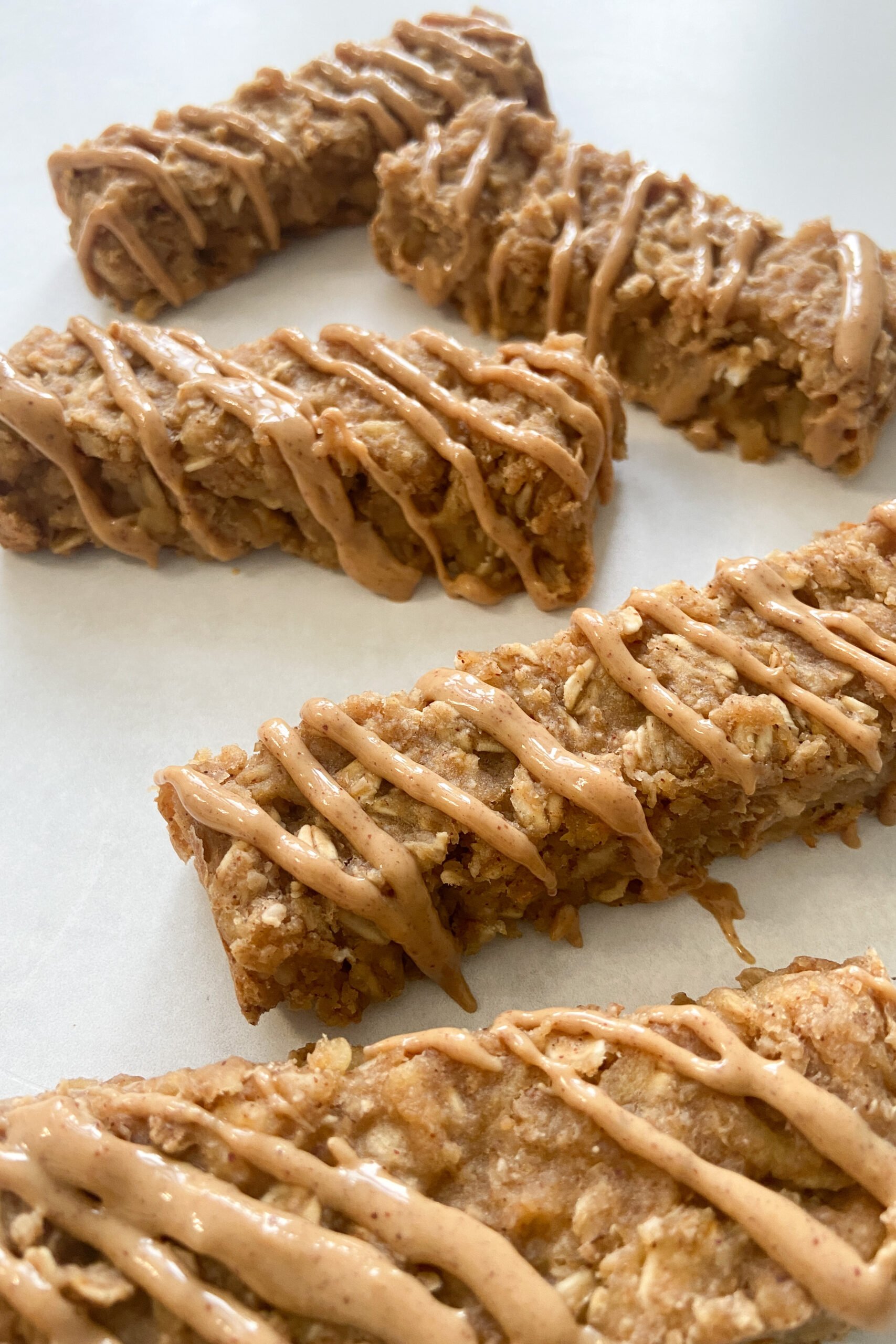 Apple oatmeal bars with peanut butter drizzle