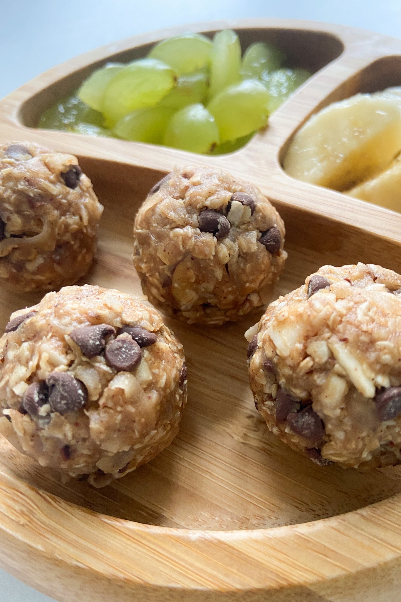 Granola balls served with fruits
