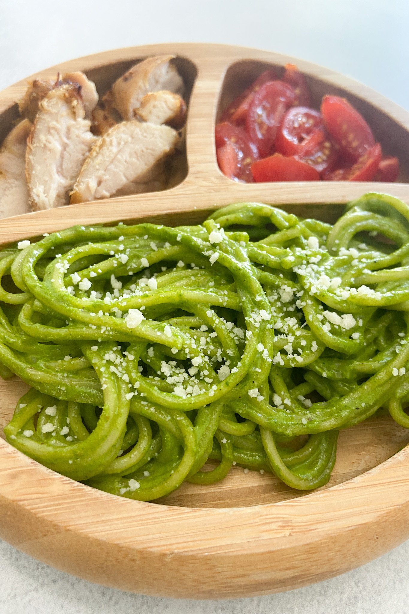 Hulk pasta served with tomatoes and chicken