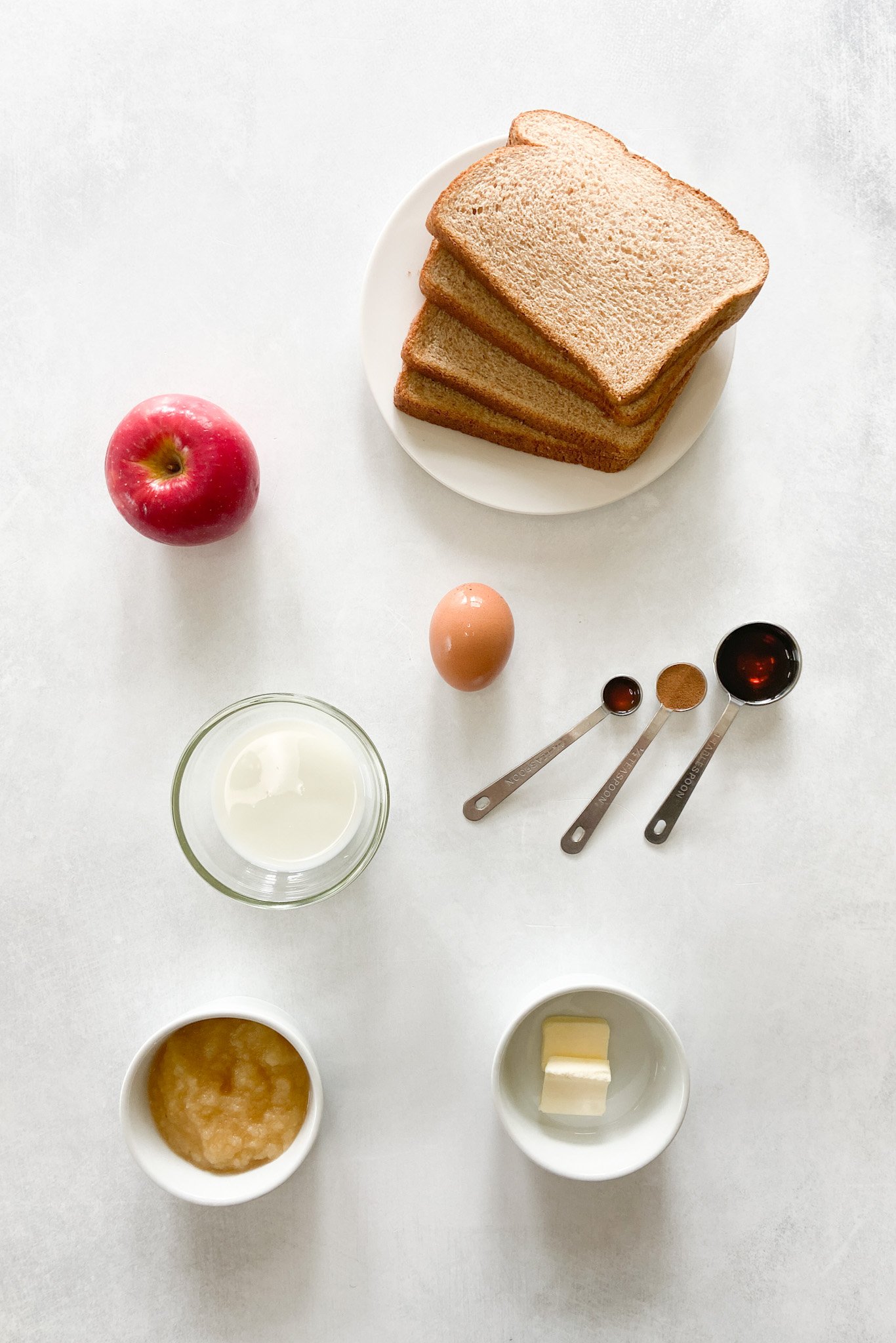Ingredients to make apple pie french toast roll ups