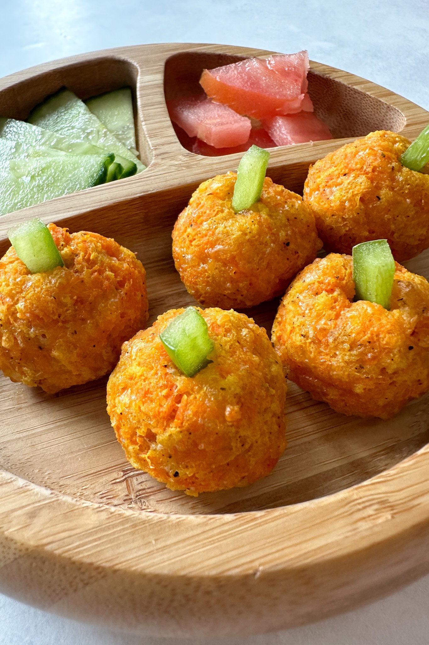 Cheesy carrot ball pumpkins.