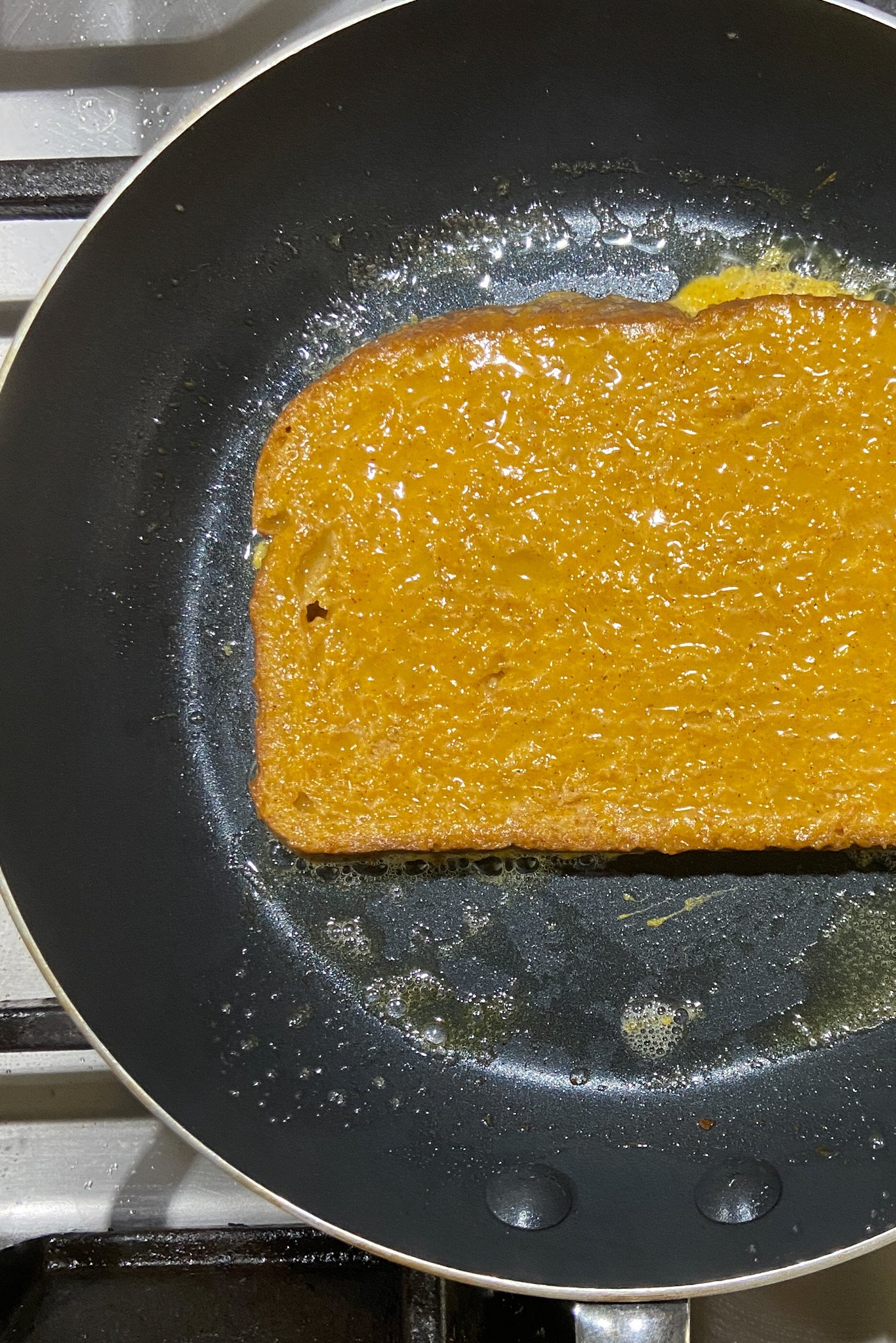 Pumpkin spiced french toast cooking.
