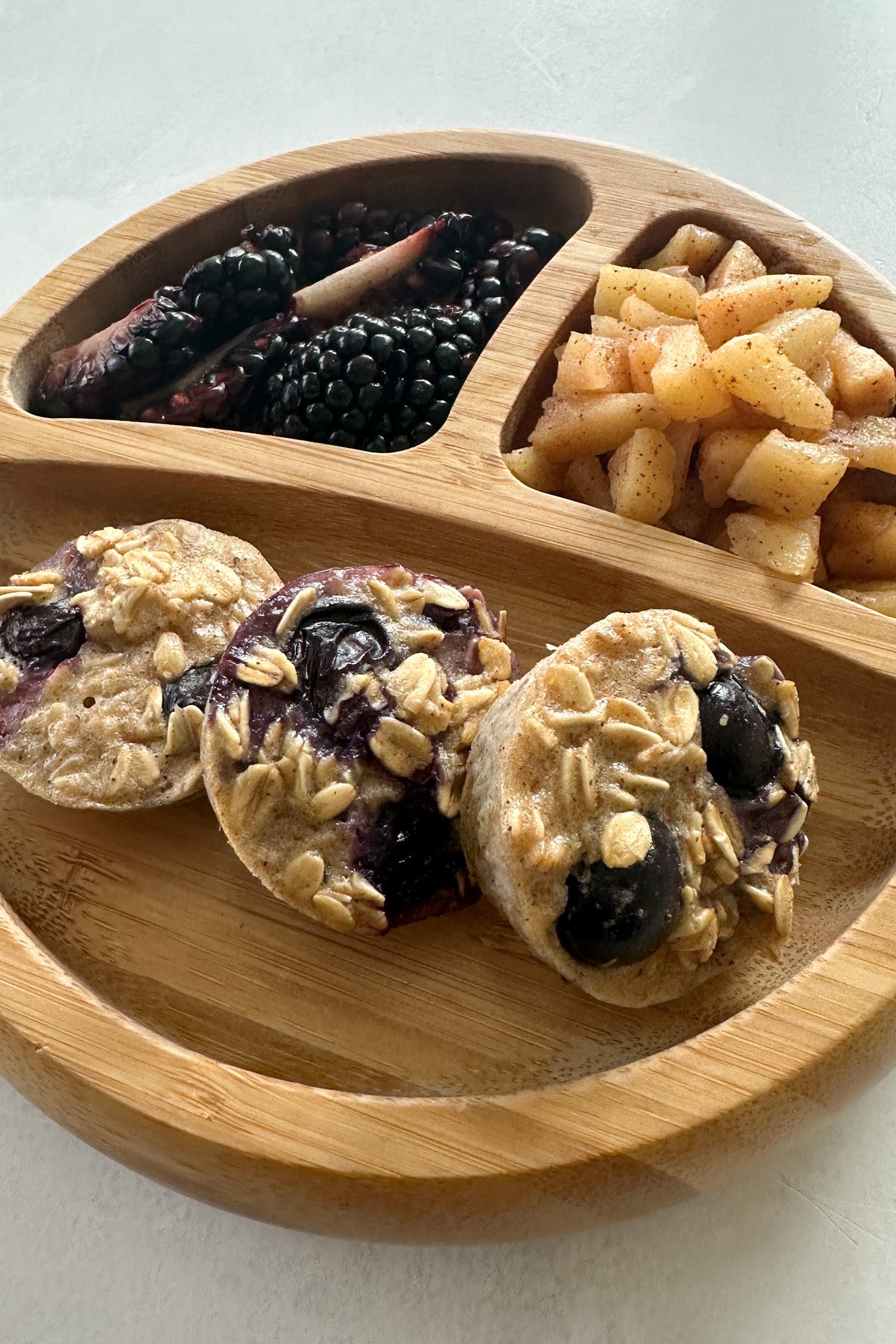 Blueberry oat bites served with fruits.