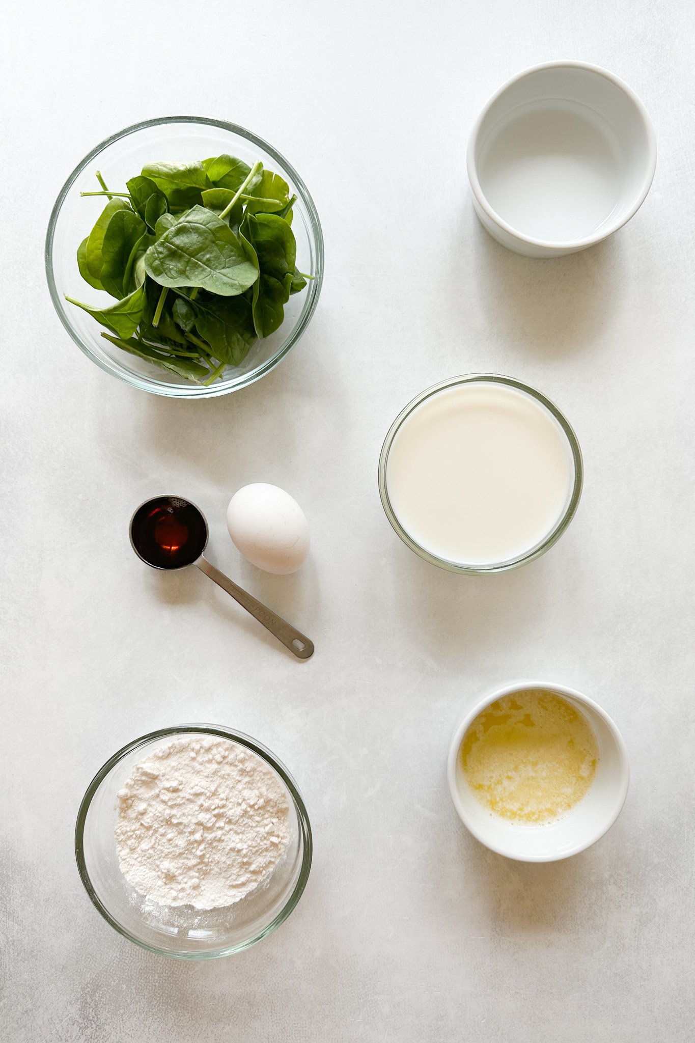 Ingredients to make spinach crepes.