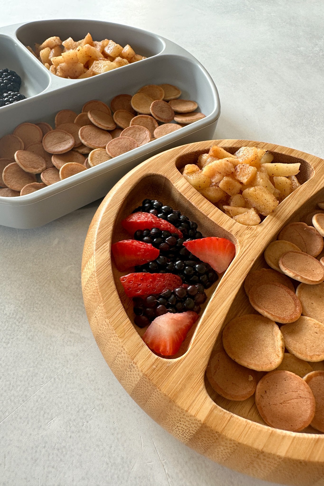 Apple flavored pancake cereal served with fruits.