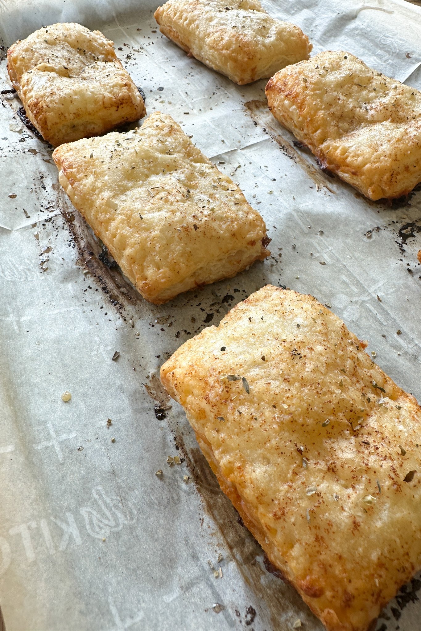 Puff pastry pizza pockets freshly baked.