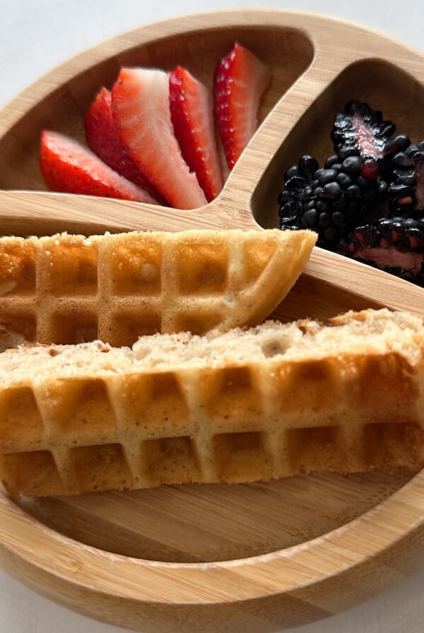 Egg free waffles served with strawberries and blackberries.