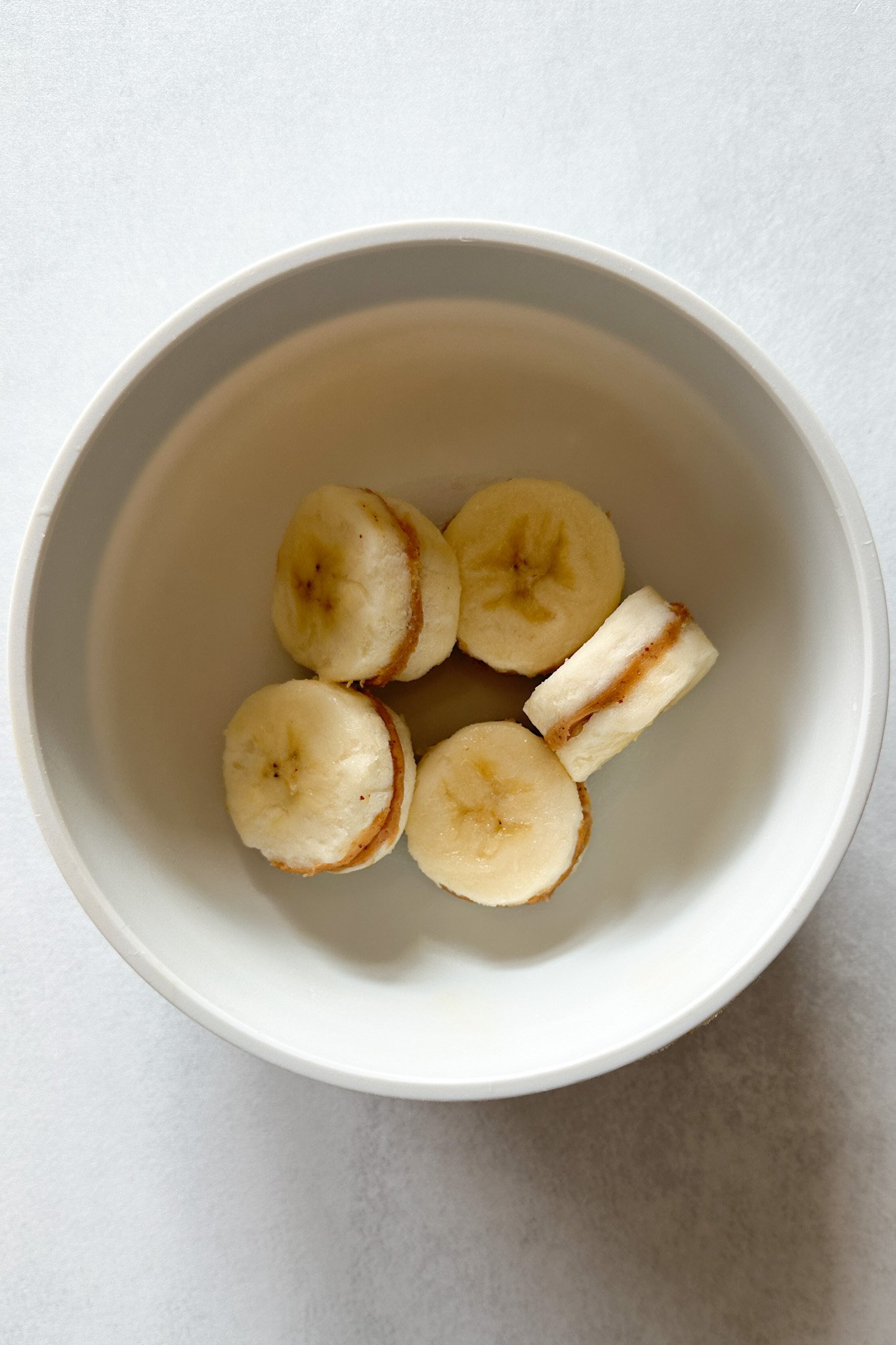 Banana bites with peanut butter.