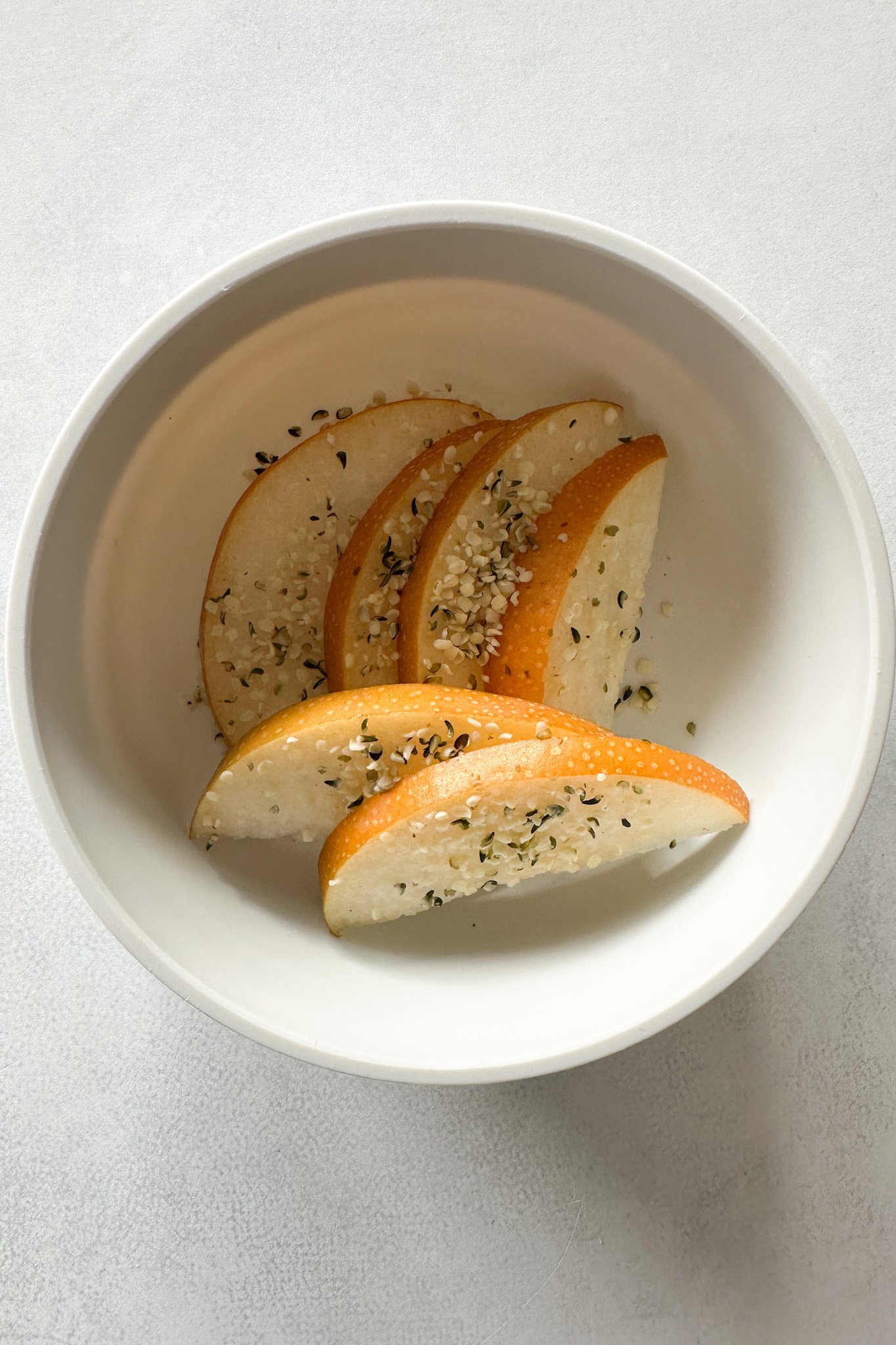 Pears with hemp hearts.