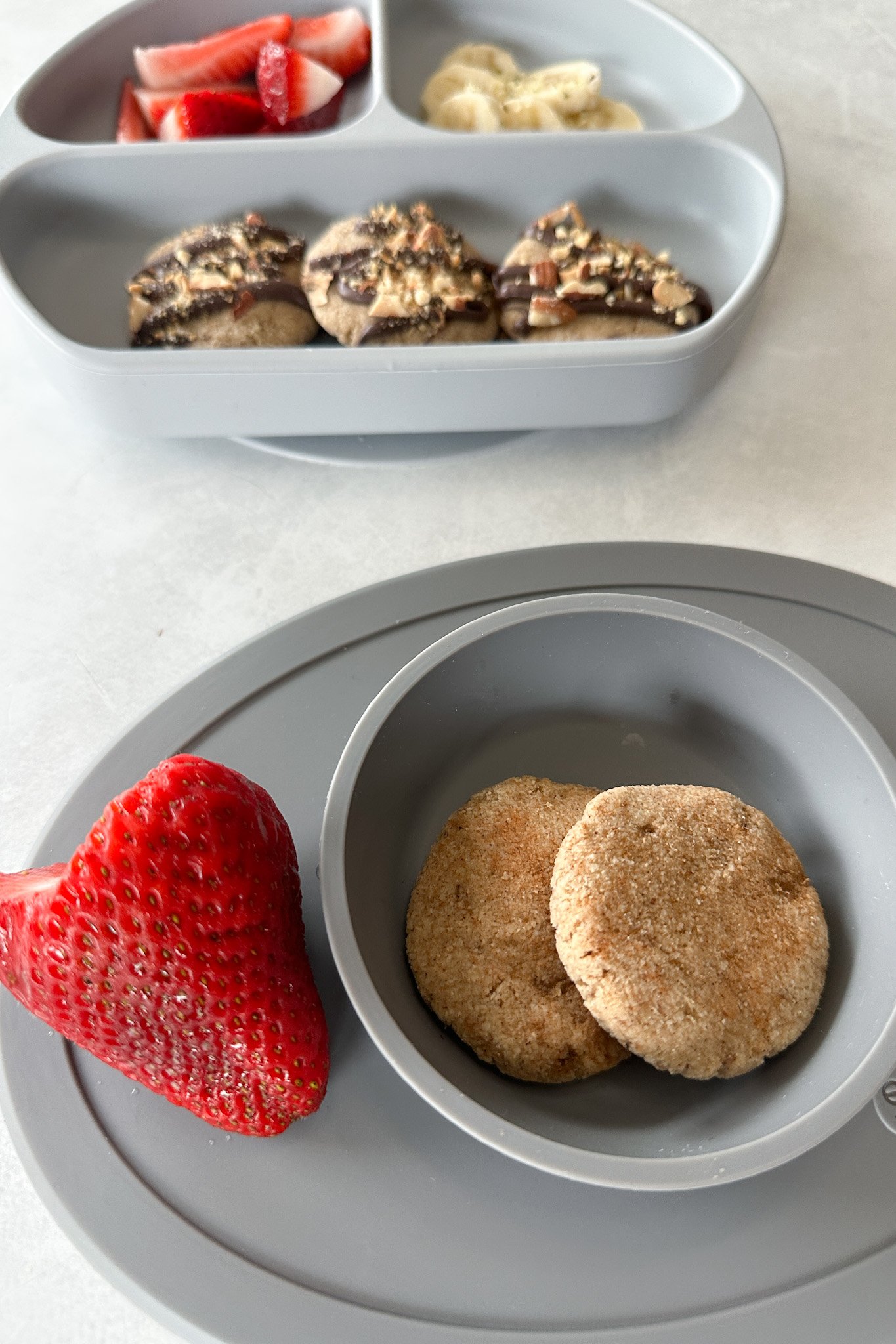 Banana bread cookies served with strawberries.