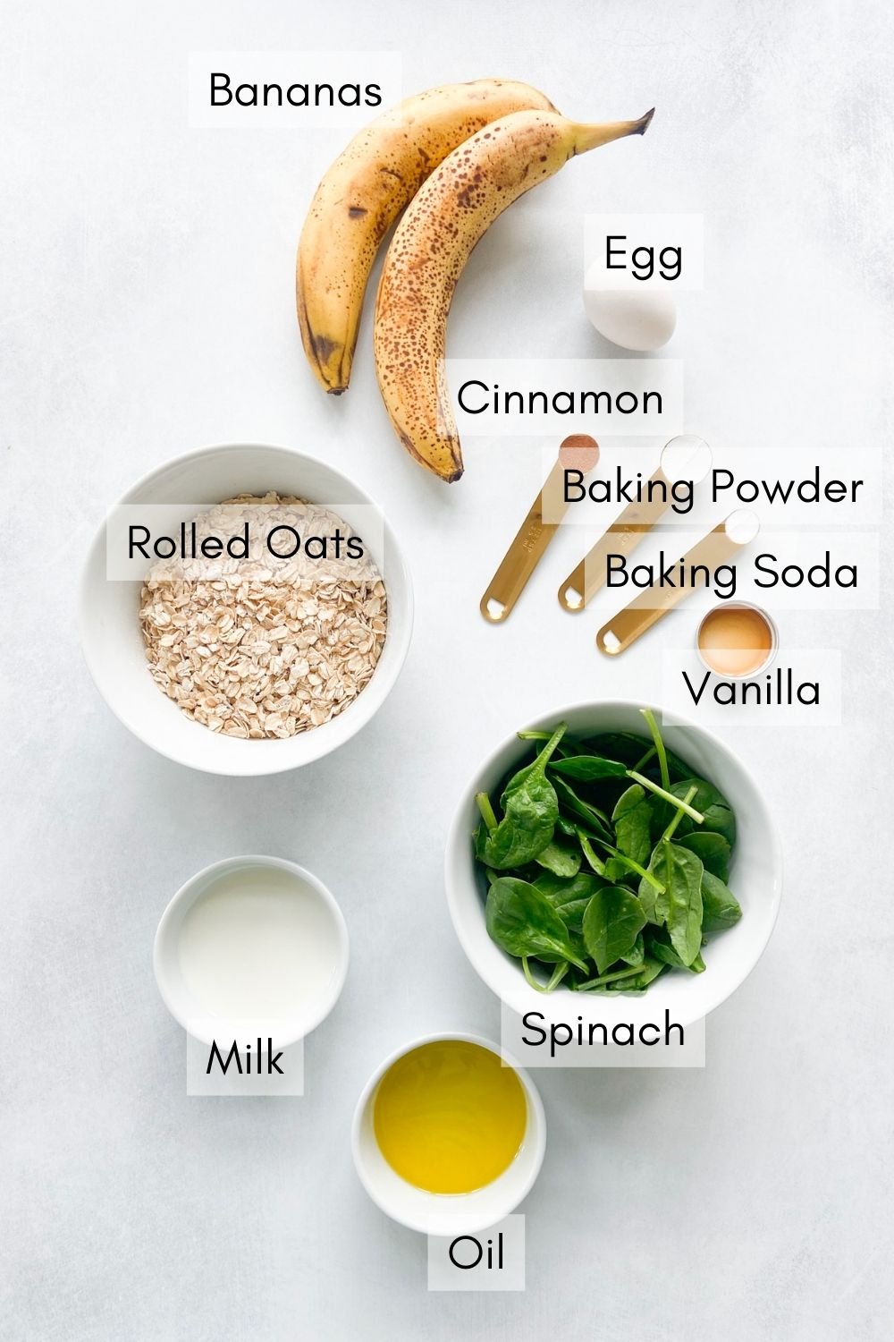 Ingredients to make spinach banana muffins.