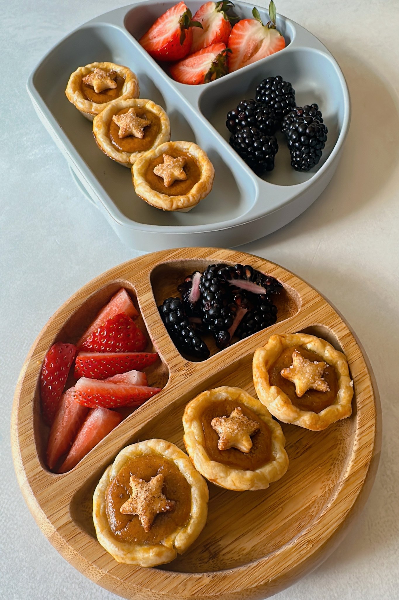Maple sweetened mini pumpkin pies served with strawberries and blackberries.