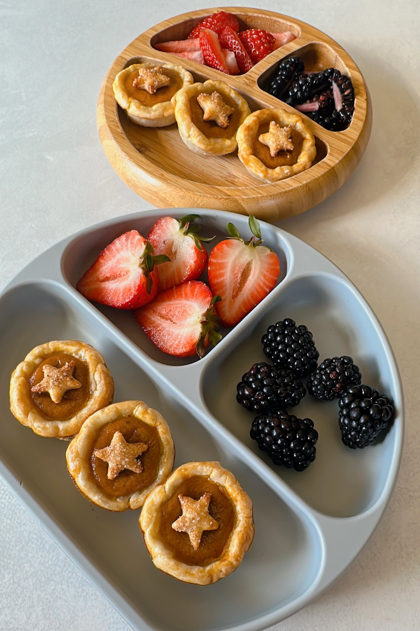 Maple sweetened mini pumpkin pies served with strawberries and blackberries.