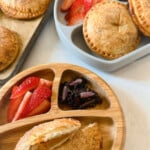 Sweet potato hand pies served with strawberries and blackberries.