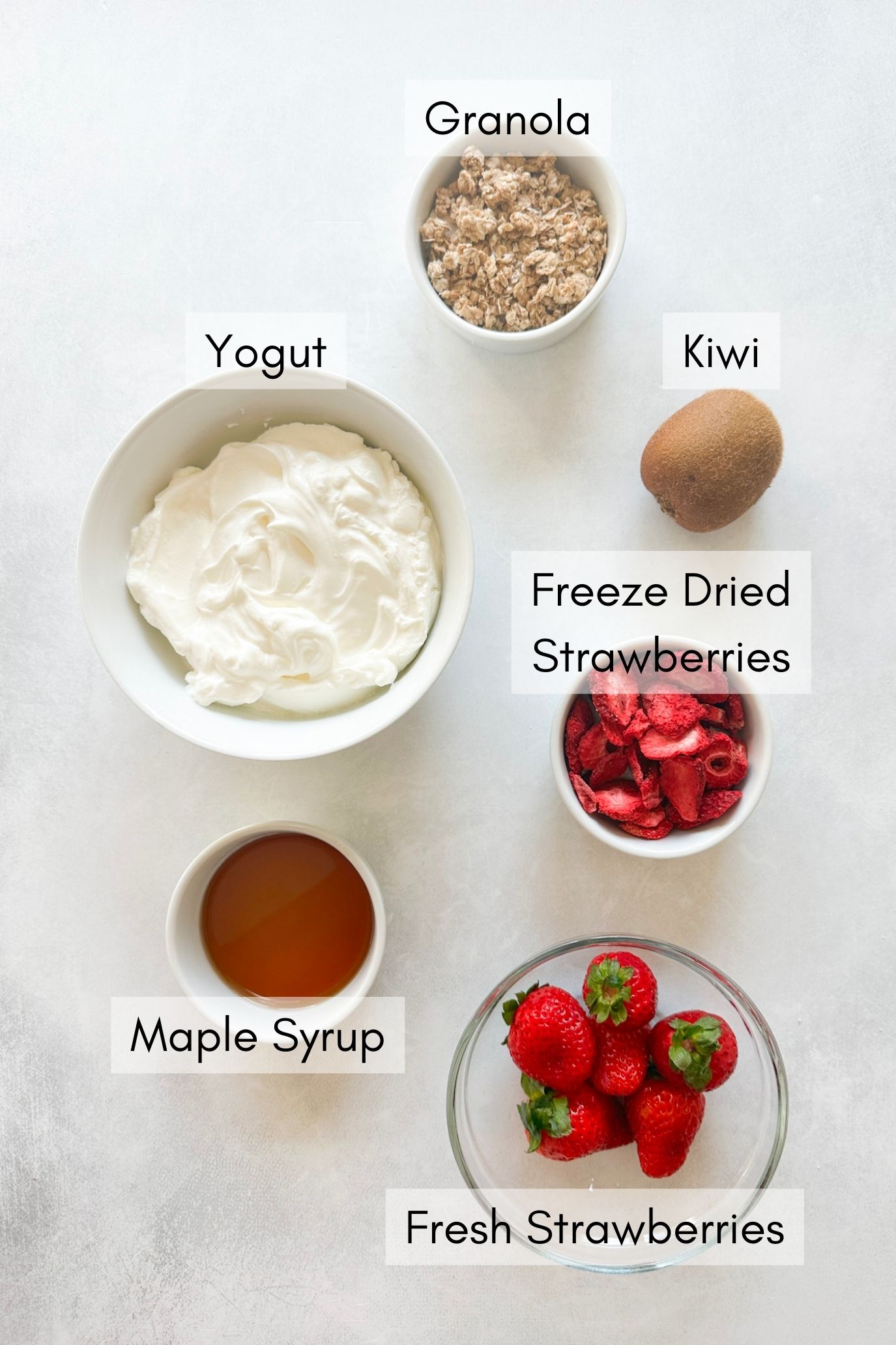 Ingredients to make strawberry yogurt bark.