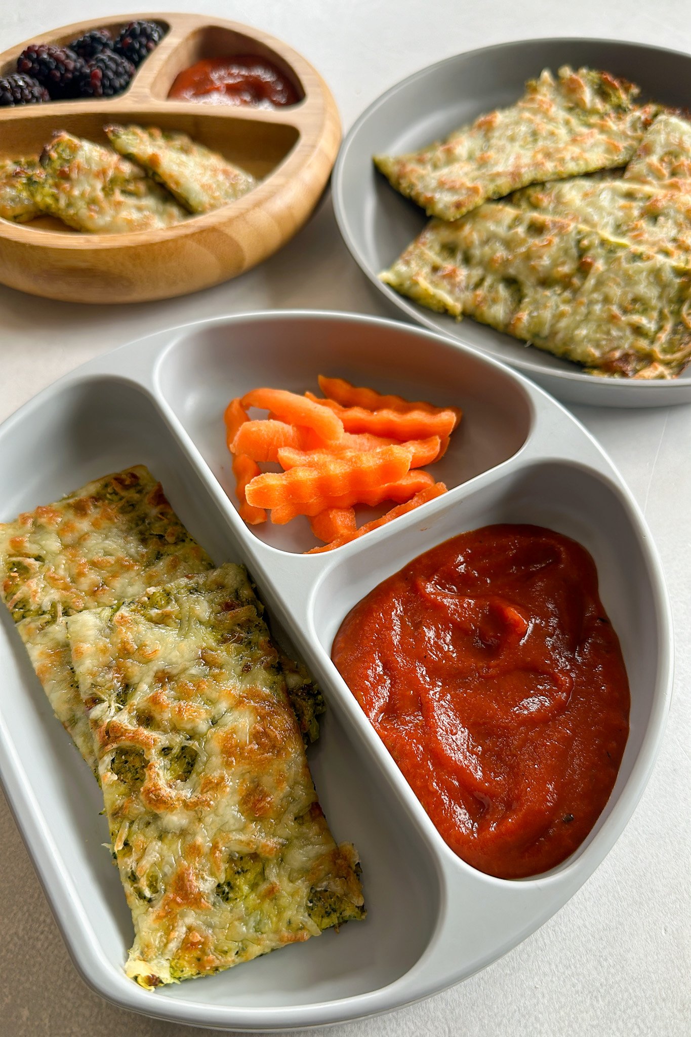 Broccoli cheese bread served with marinara sauce.