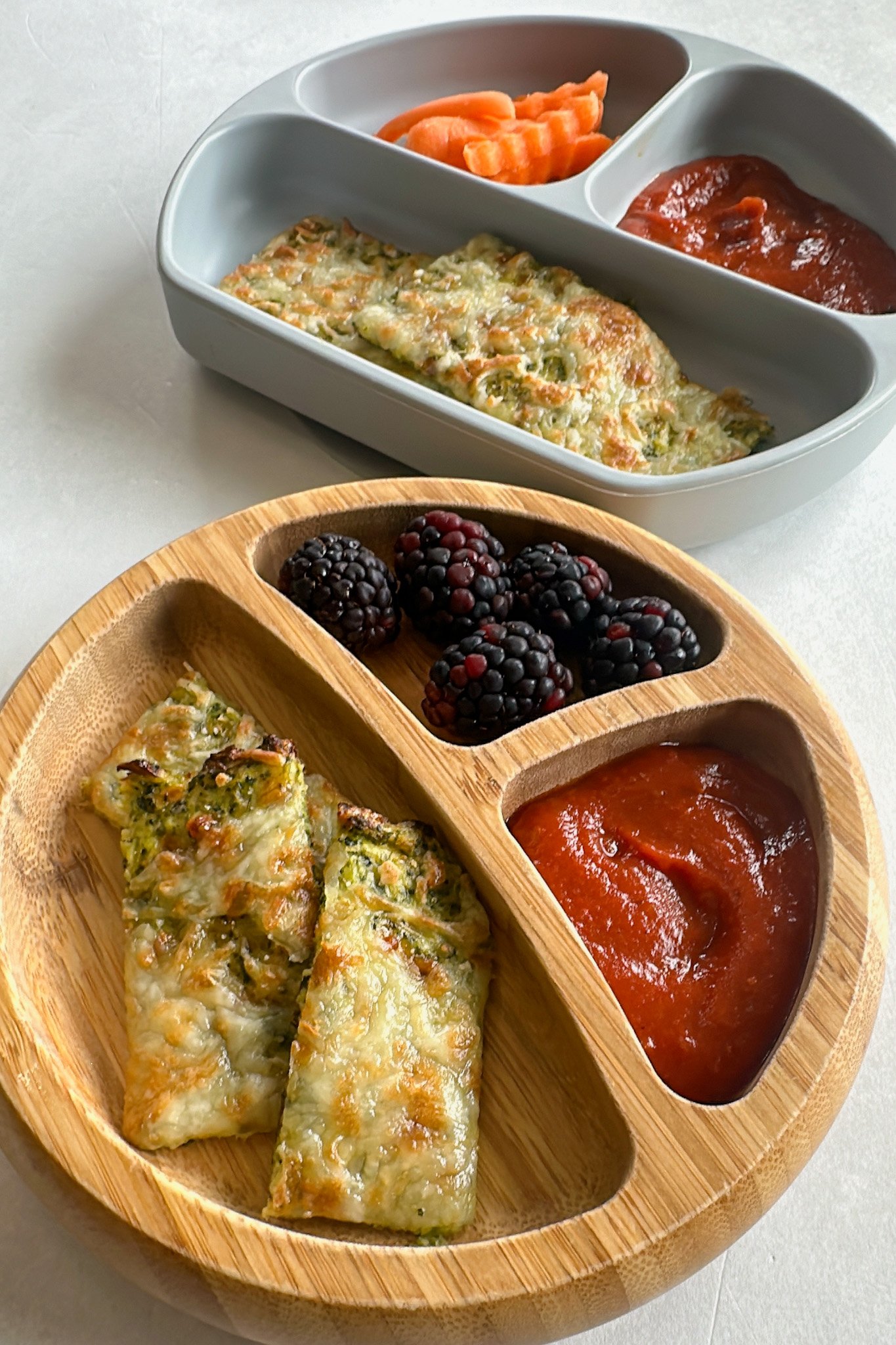 Broccoli cheese bread served with marinara sauce.