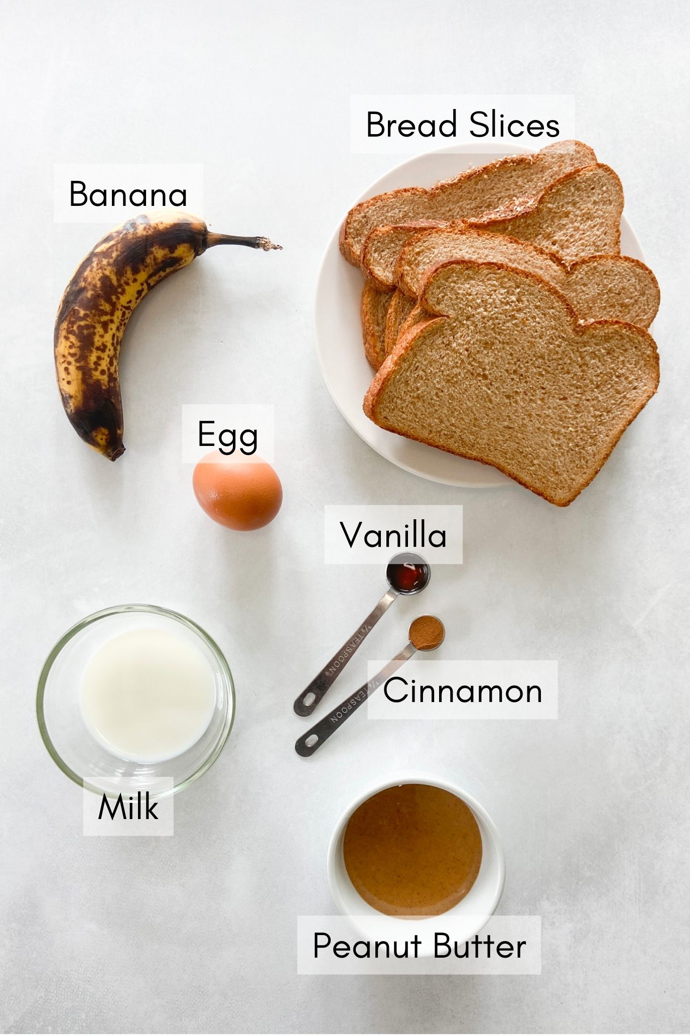 Ingredients to make peanut butter banana French toast sticks.