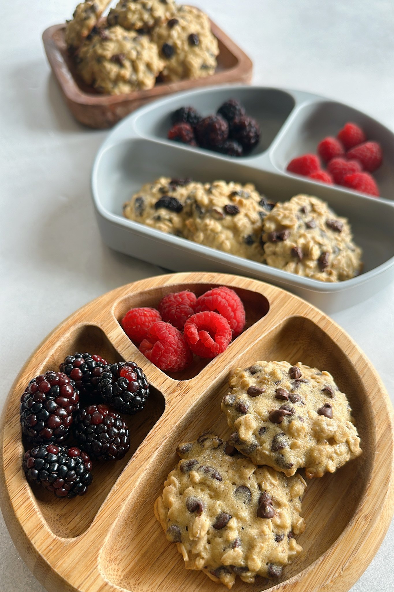 Maple oatmeal cookies served with berries.