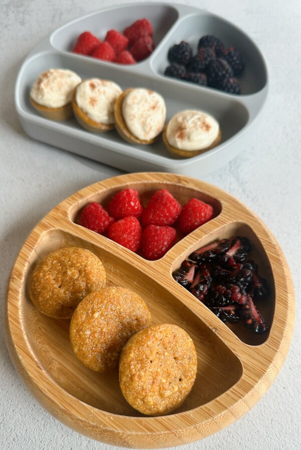 Mini carrot cake muffins served with berries.