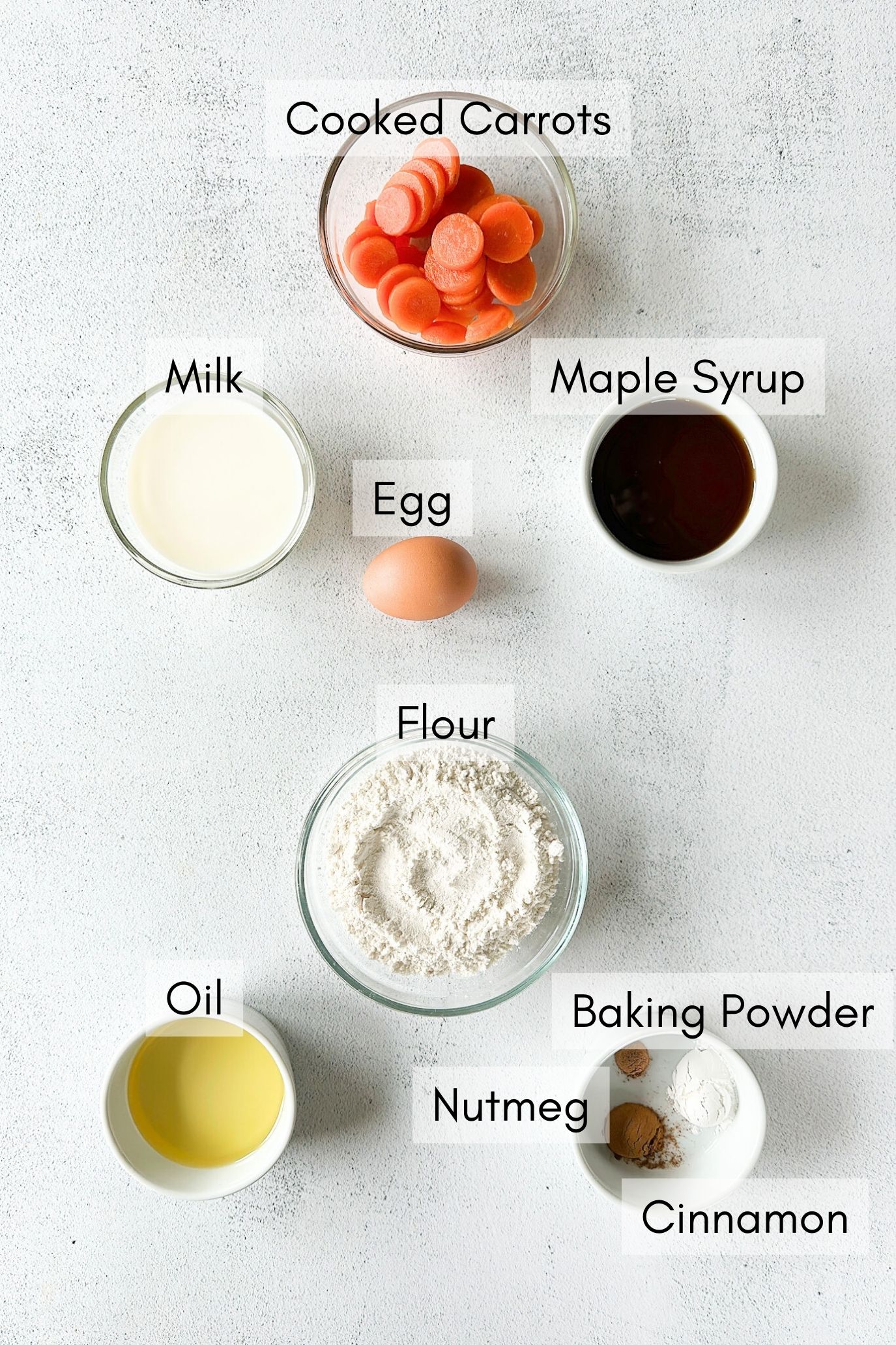 Ingredients to make baked carrot cake donuts.