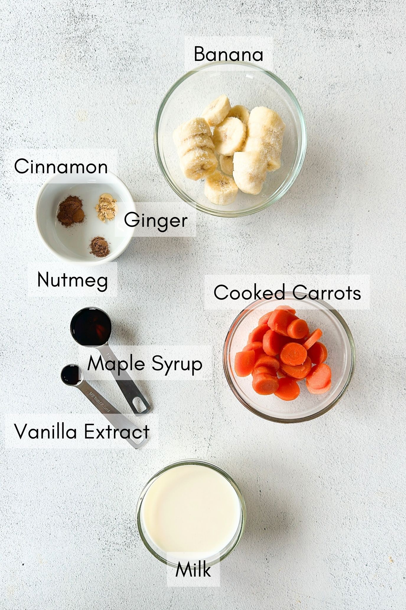 Ingredients to make carrot banana smoothie.