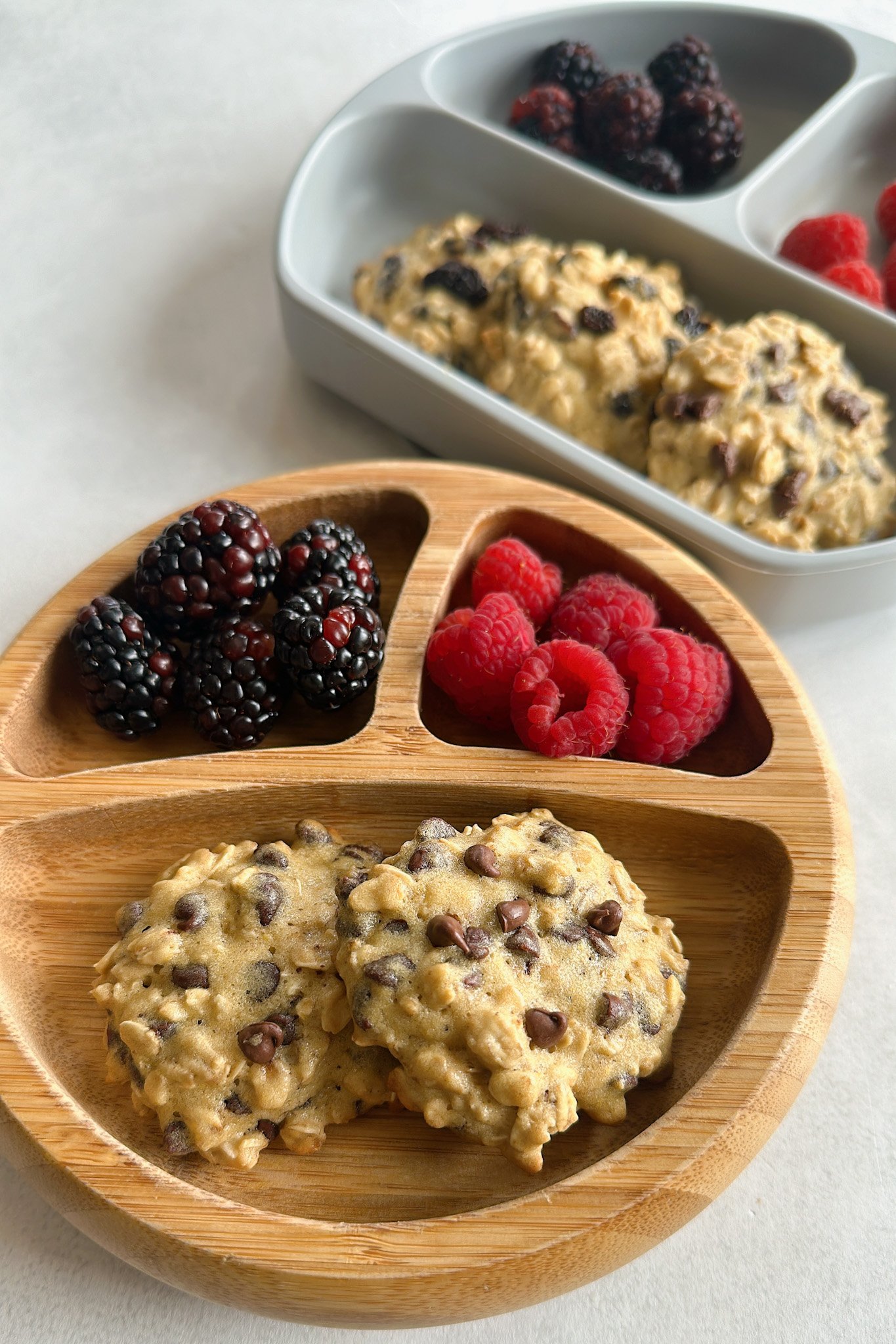 Maple oatmeal cookies served with berries.