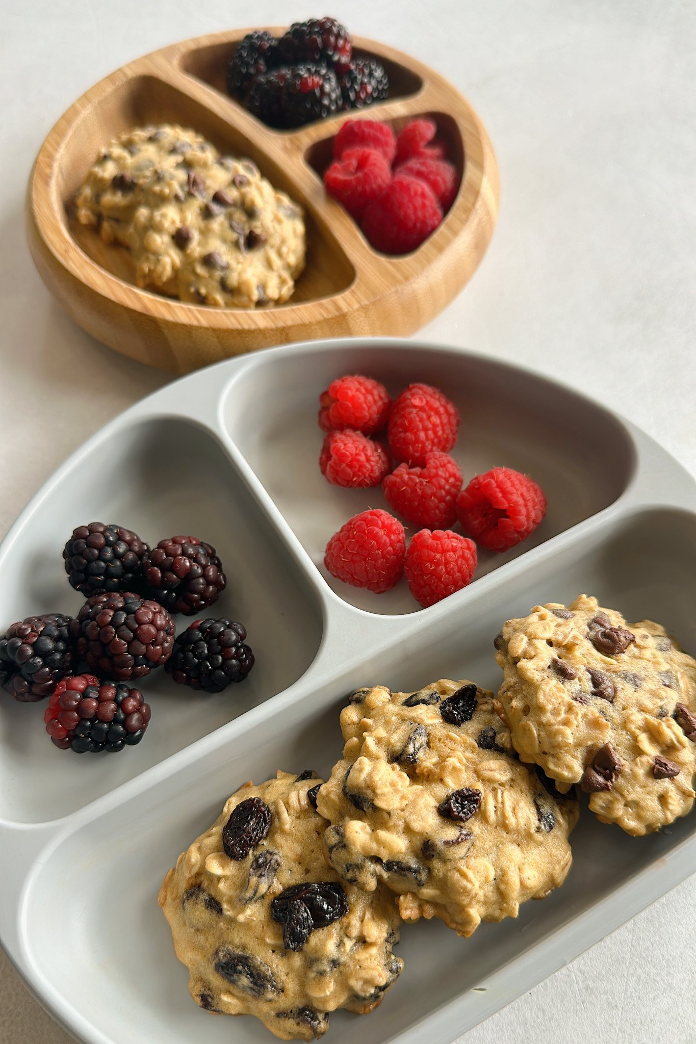 Maple oatmeal cookies served with berries.