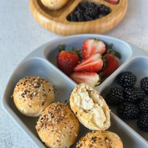 Stuffed everything bagel bites served with berries.
